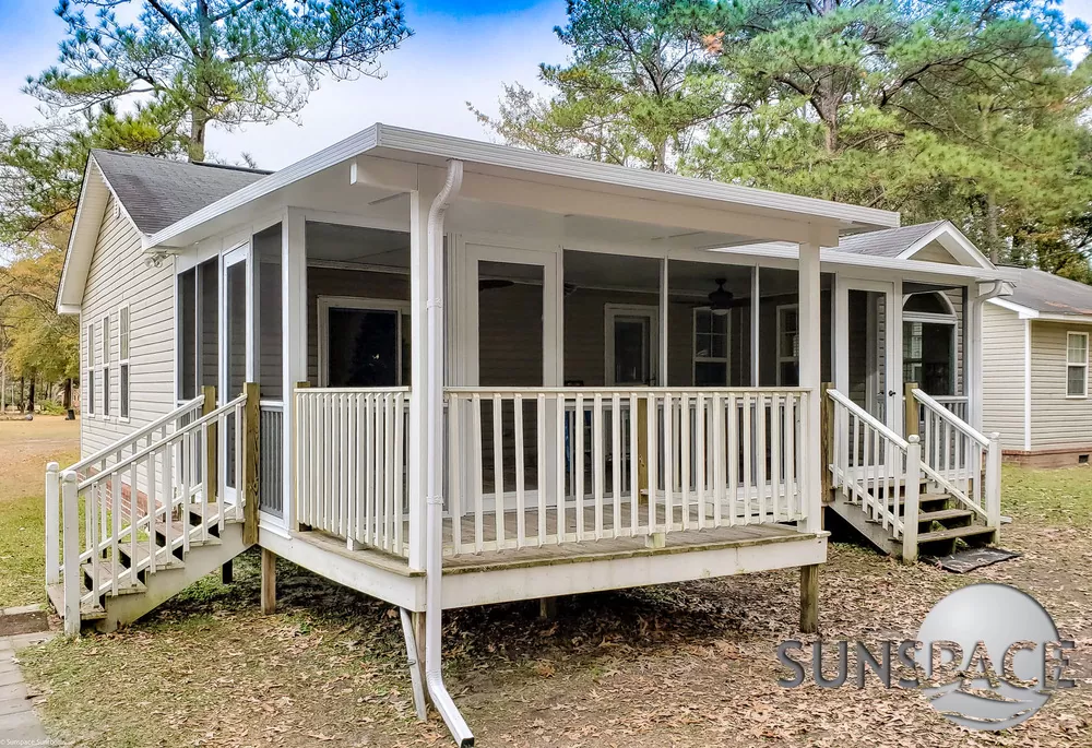 White Sunspace screen porch with ceiling fans